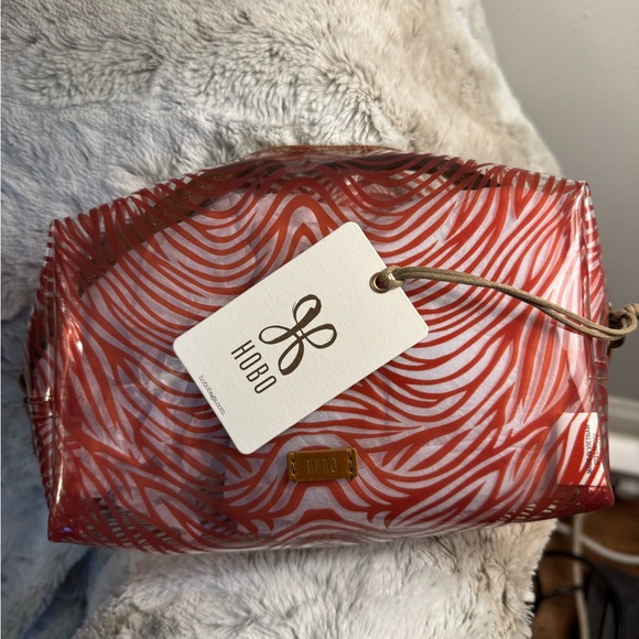 HOBO medium zip Cosmetic Bag in clear zebra print - Picture 1 of 5